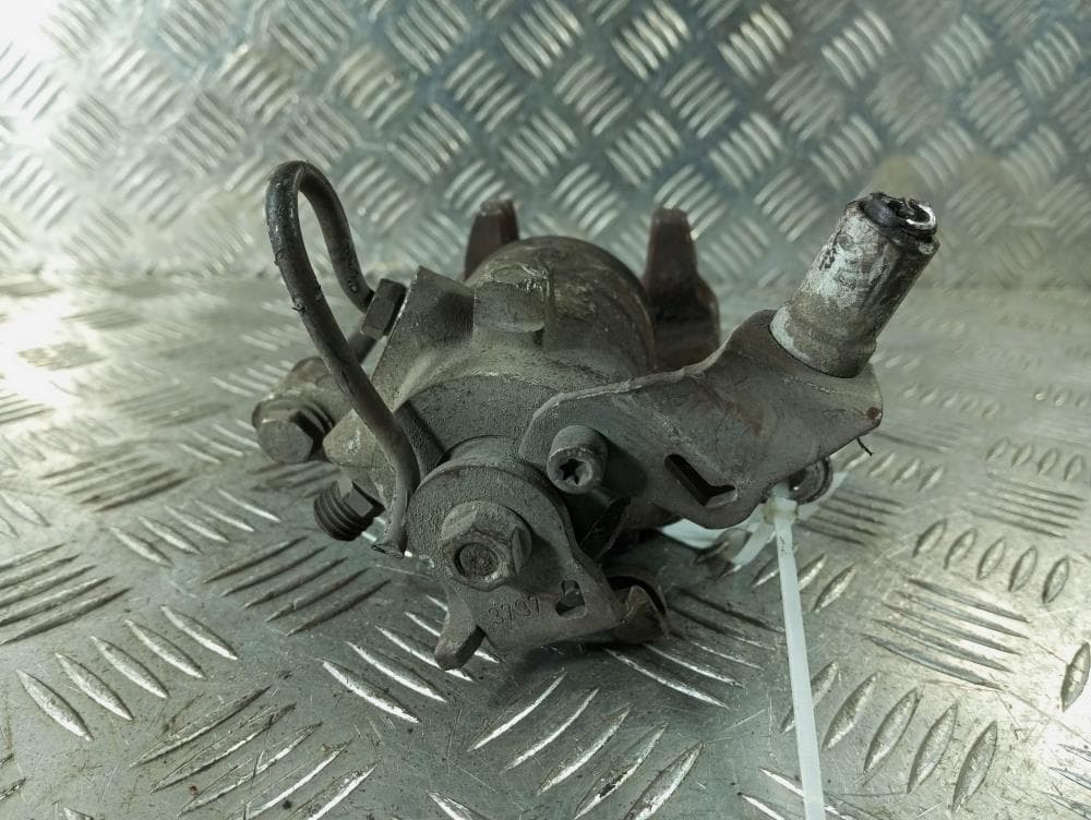 Суппорт задний левый к Citroen C4 1 (04-08)