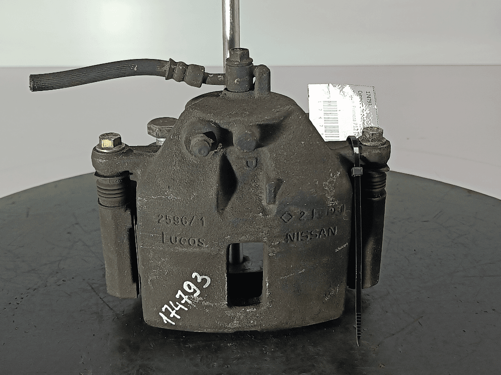 Суппорт передний правый к Nissan  Primera P12 (02-08)