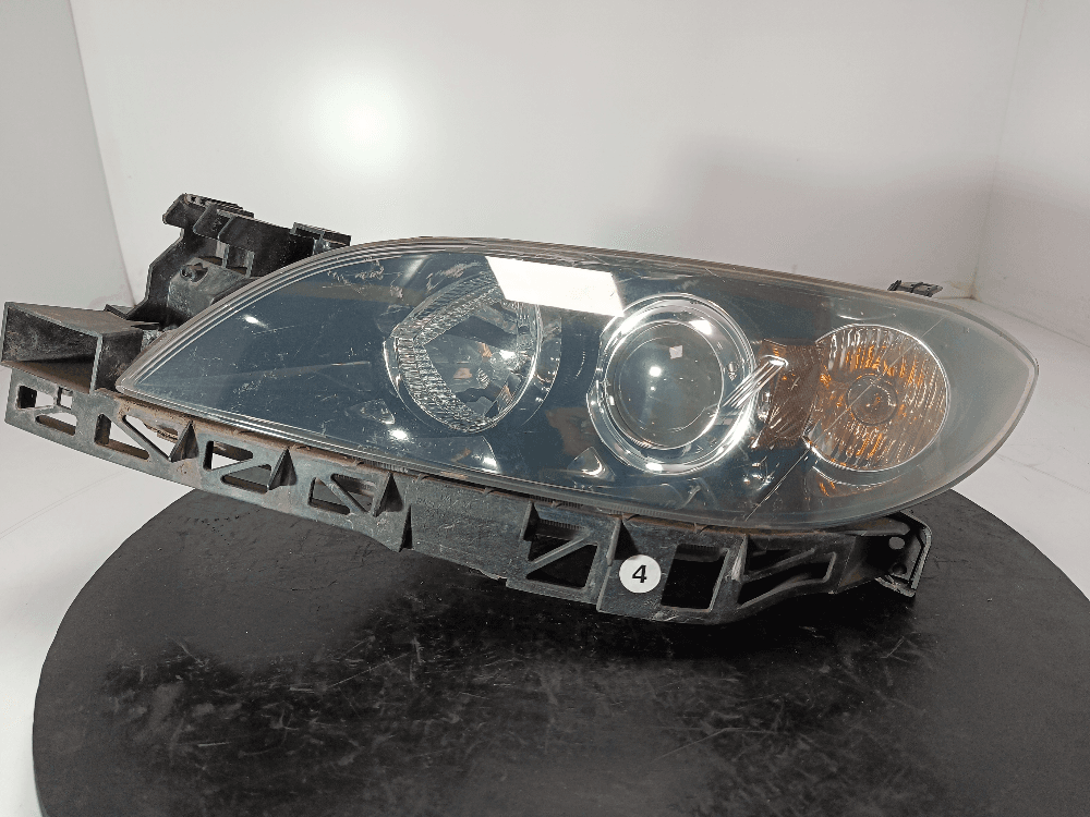 Фара левая к Mazda 3 BK (03-06)