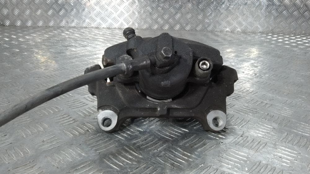 Суппорт передний левый к Skoda Octavia Tour Рестайлинг (00-10)