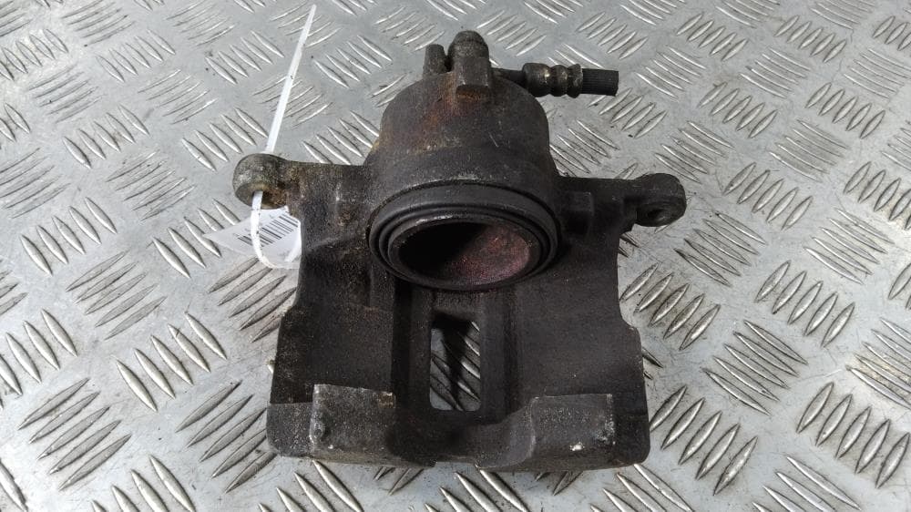 Суппорт передний правый к Nissan  Almera N16 Рестайлинг (03-06)