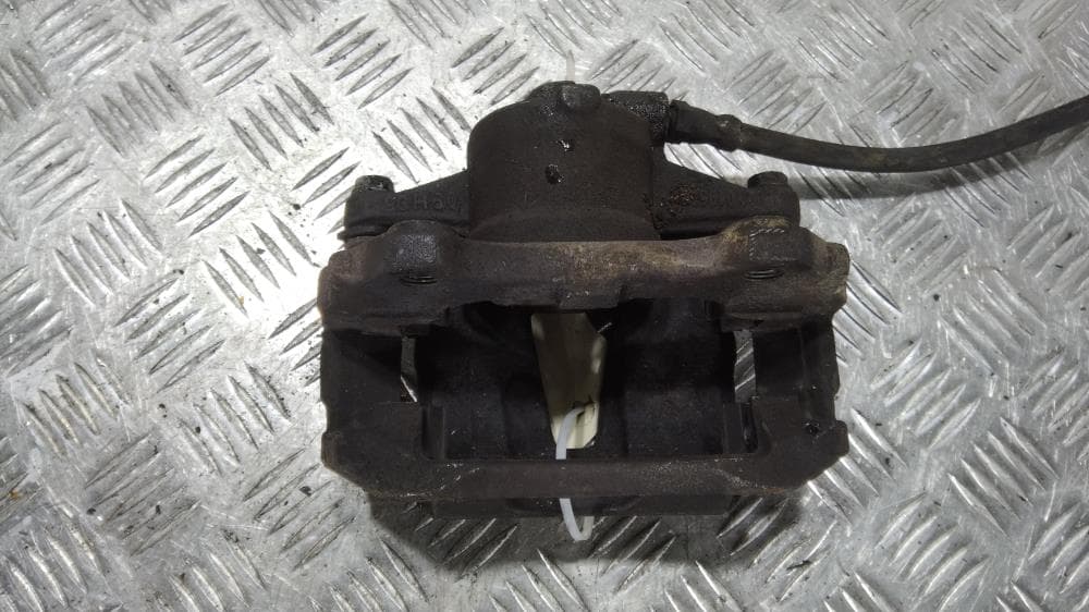 Суппорт передний правый к Opel Corsa D (06-11)