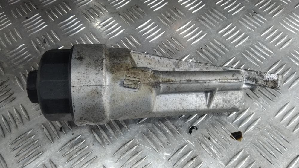 Корпус масляного фильтра к Opel Astra H (04-07)