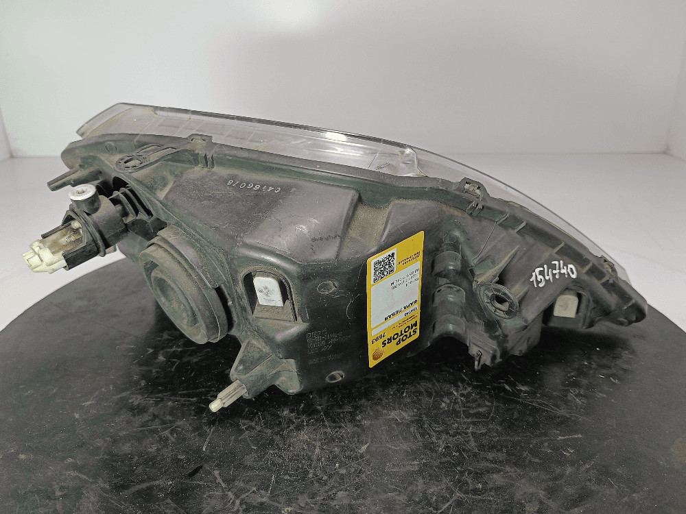 Фара левая к Renault Logan 1 (04-09)