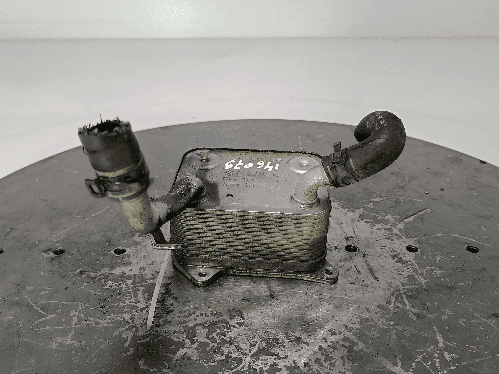 Теплообменник масляного фильтра к Audi A4 B7 (04-09)