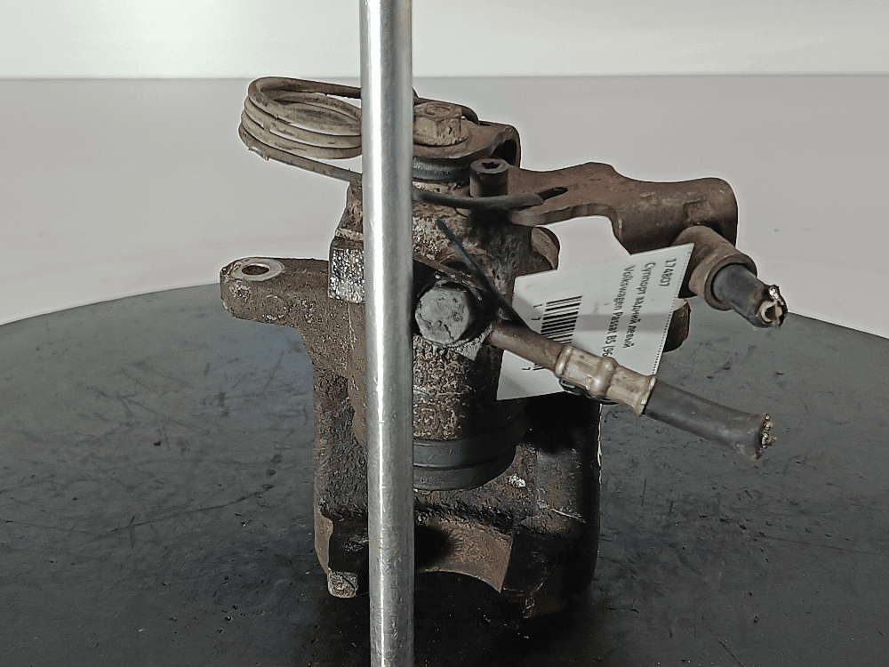 Суппорт задний левый к Volkswagen Passat B5 (96-00)