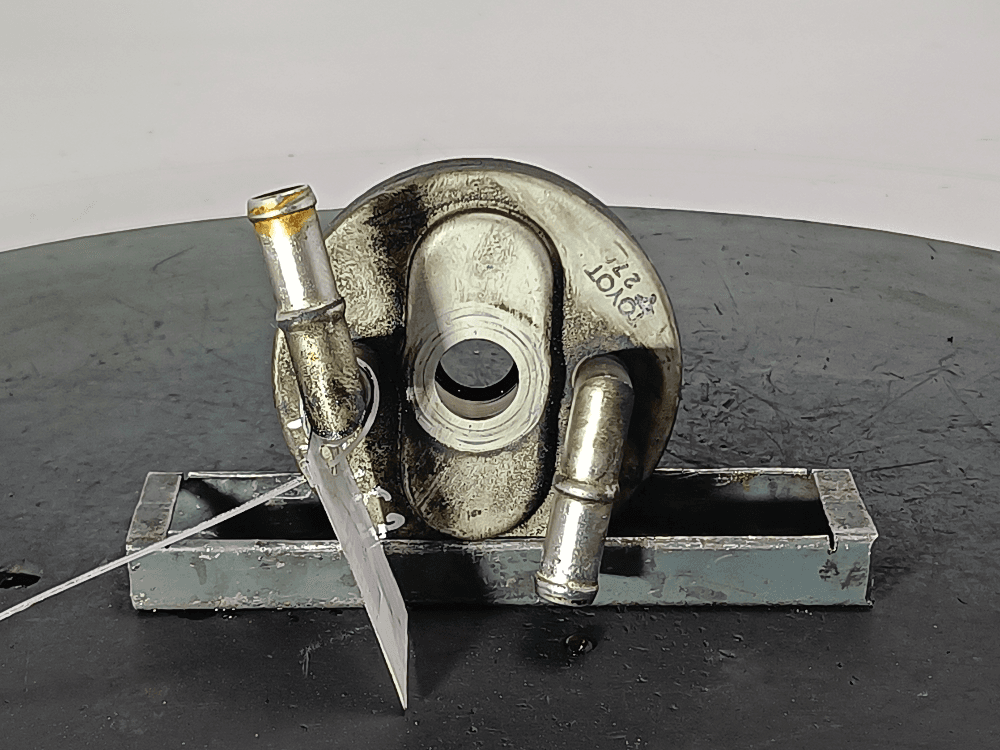 Теплообменник масляного фильтра к Toyota Avensis 2 (03-06)