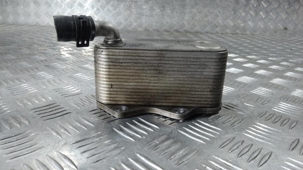 Теплообменник масляного фильтра к Volkswagen Golf 5 (03-09)
