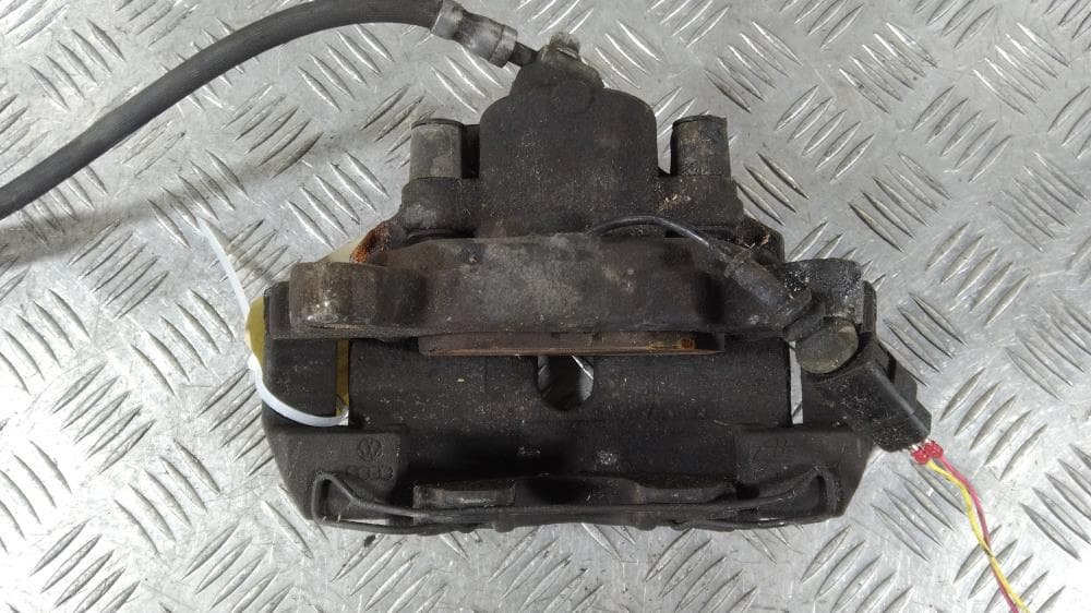 Суппорт передний левый к Volkswagen Passat B6 (05-10)