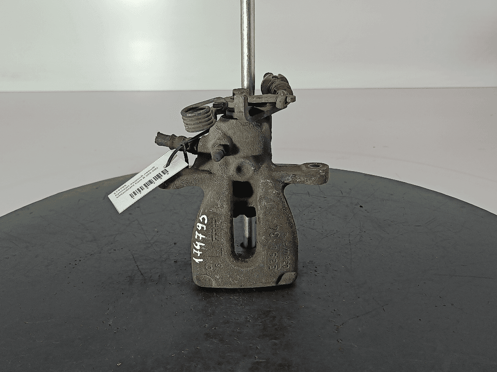 Суппорт задний левый к Mitsubishi Colt 6 (02-08)