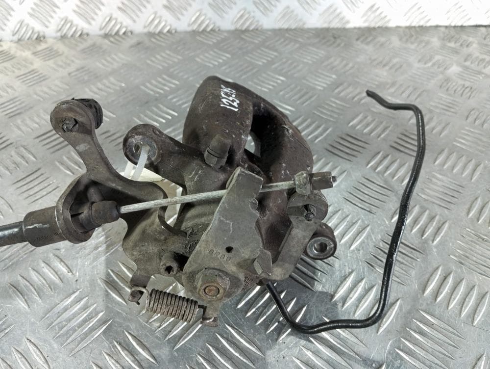 Суппорт задний правый к Citroen Berlingo 2 (08-12)