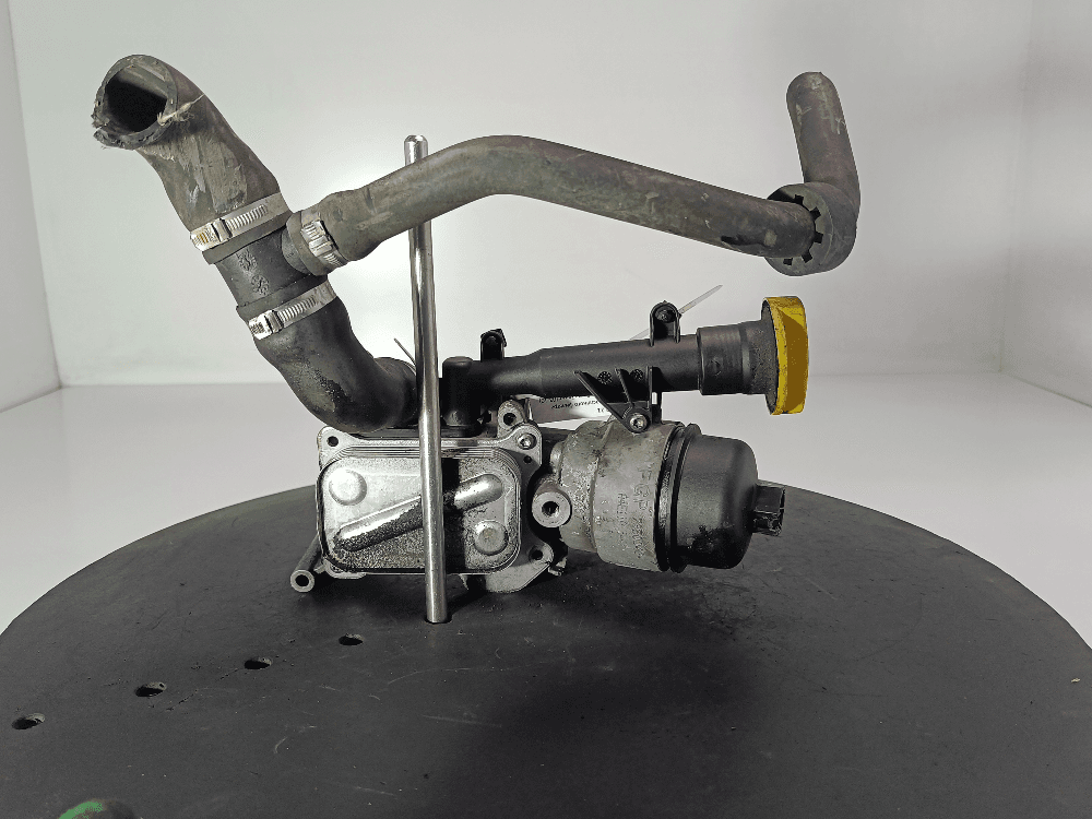 Корпус масляного фильтра к Fiat Punto 2 Рестайлинг (03-10)