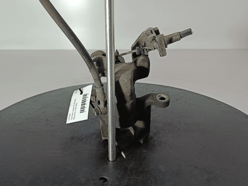 Суппорт задний левый к Mazda 6 1 (02-05)