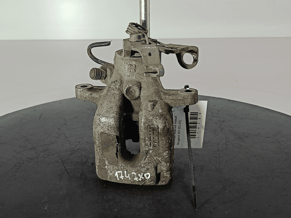 Суппорт задний левый к Peugeot 307 (01-05)