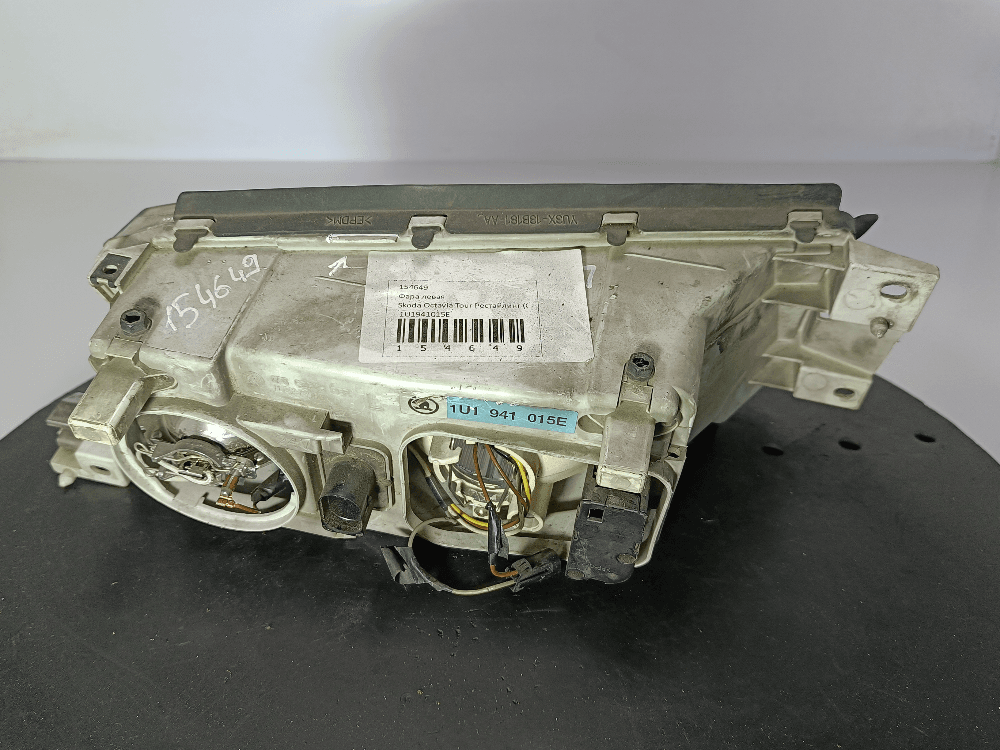 Фара левая к Skoda Octavia Tour Рестайлинг (00-10)