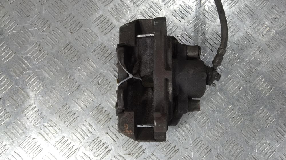 Суппорт передний левый к Skoda Octavia Tour Рестайлинг (00-10)