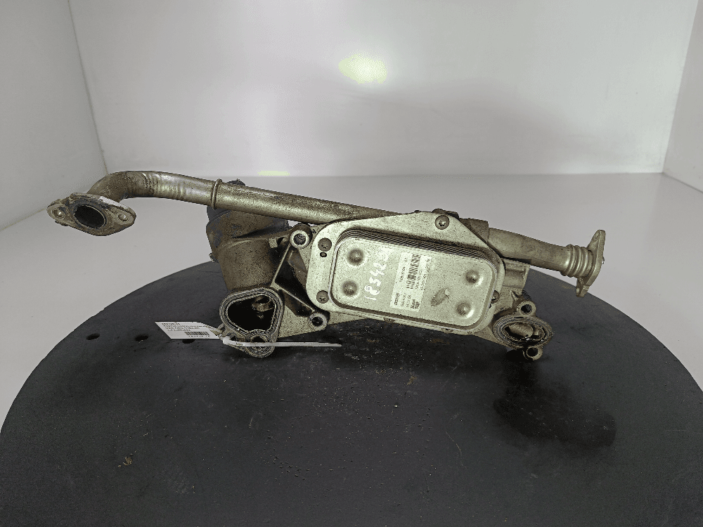 Корпус масляного фильтра к Opel Astra H (04-07)