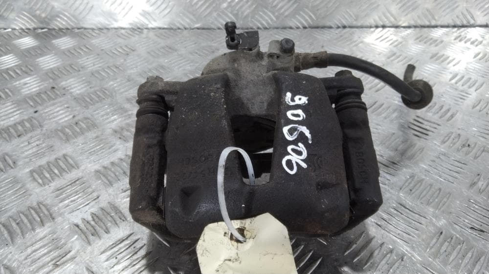 Суппорт передний левый к Opel Corsa D (06-11)