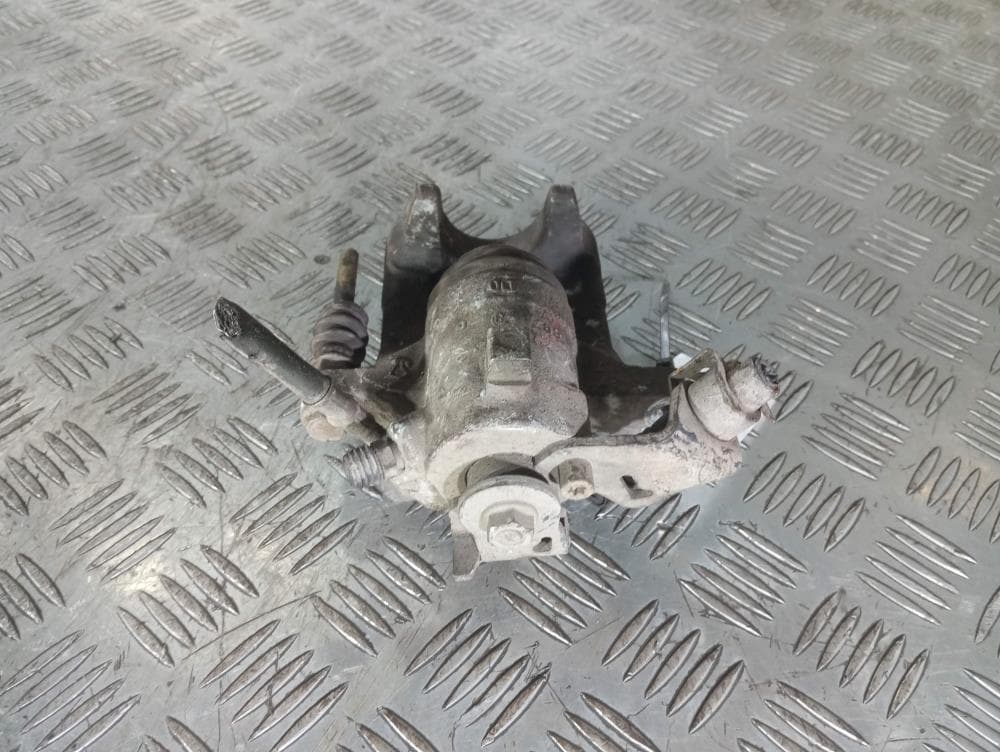 Суппорт задний левый к Volkswagen Golf 4 (97-06)