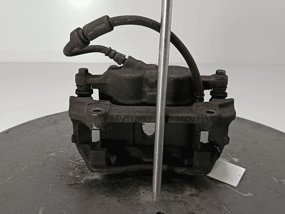 Суппорт передний левый к Renault Trafic 2 (01-06)