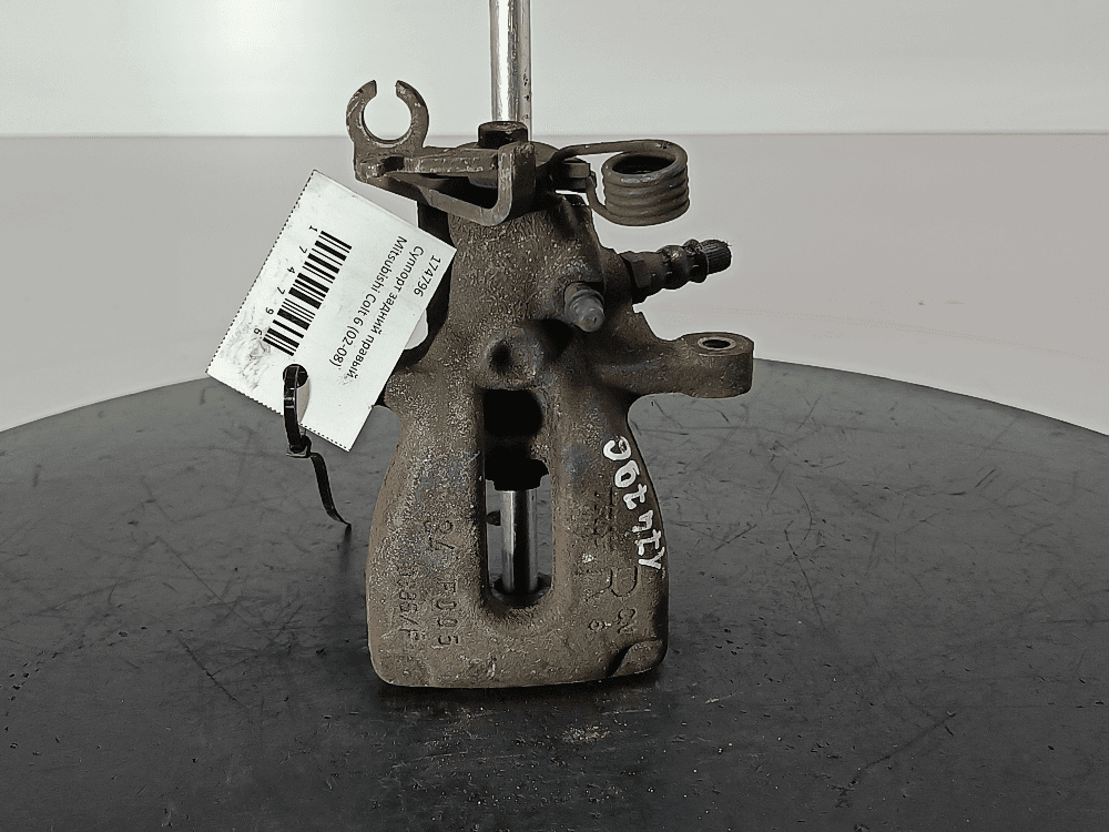 Суппорт задний правый к Mitsubishi Colt 6 (02-08)