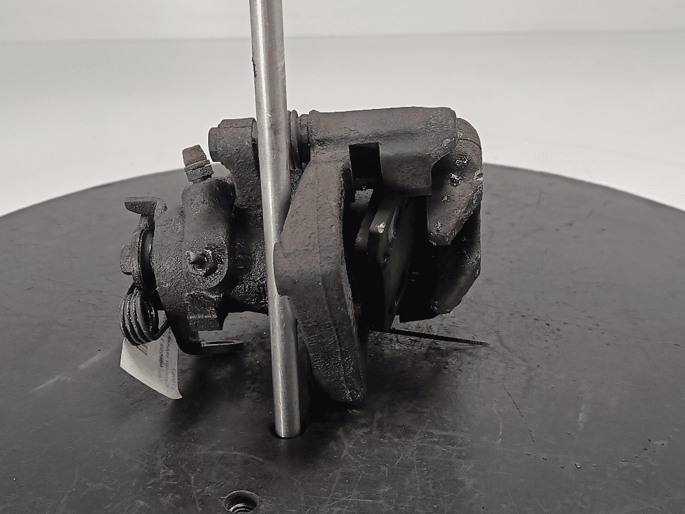 Суппорт задний левый к Peugeot 208 1 (12-15)