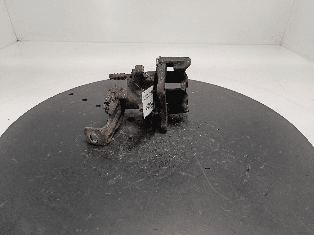 Суппорт задний правый к Nissan  Almera N16 Рестайлинг (03-06)