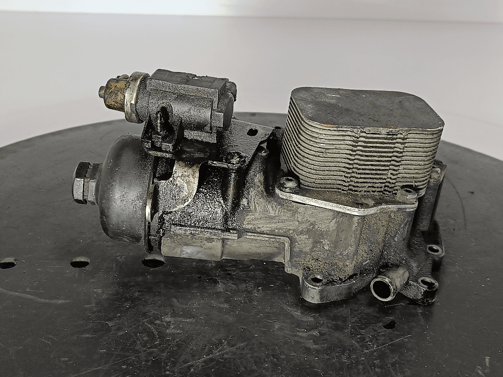 Корпус масляного фильтра к Peugeot 3008 1 (10-13)