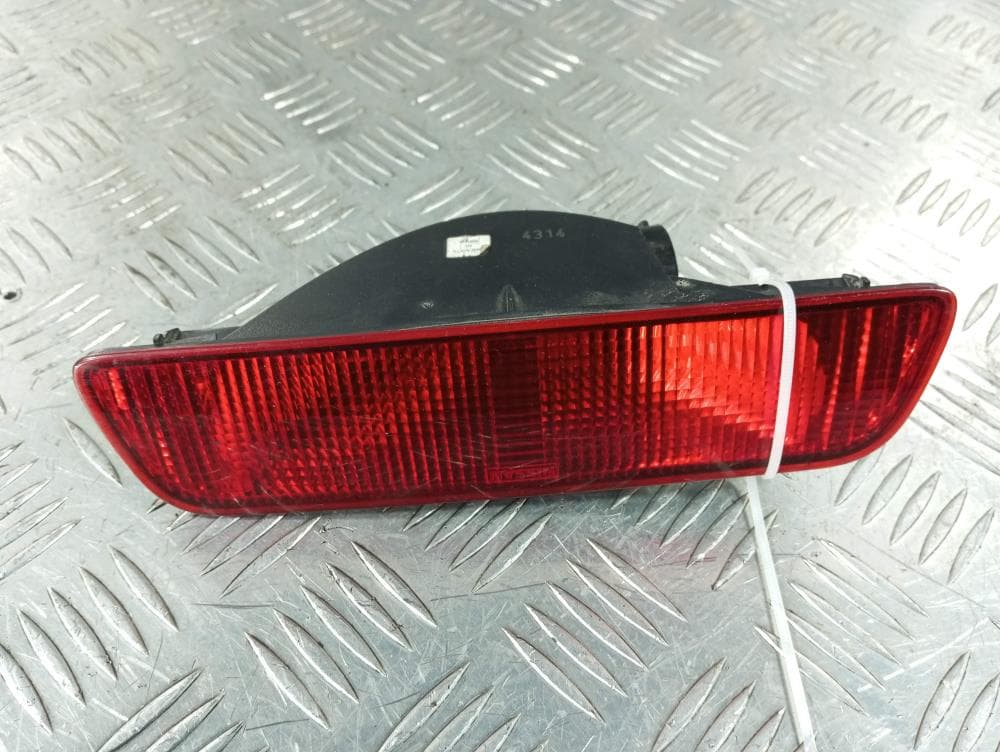 Фонарь противотуманный центральный к Nissan  Qashqai 1 (07-10)