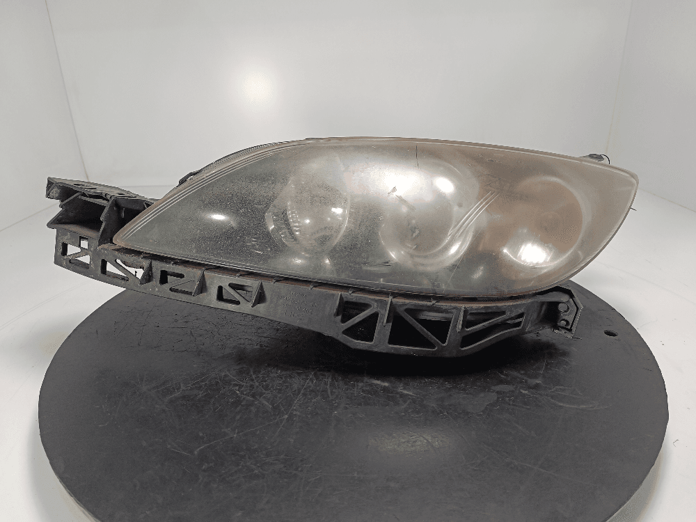 Фара левая к Mazda 3 BK Рестайлинг (06-09)