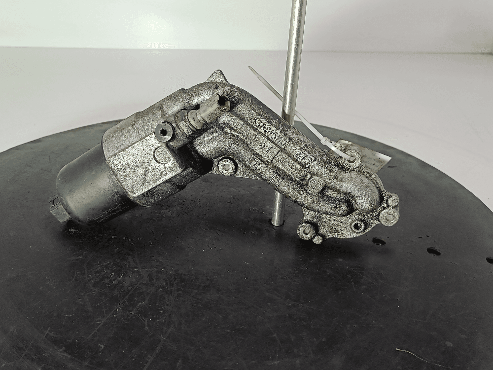 Корпус масляного фильтра к Citroen Saxo 1 Рестайлинг (99-04)