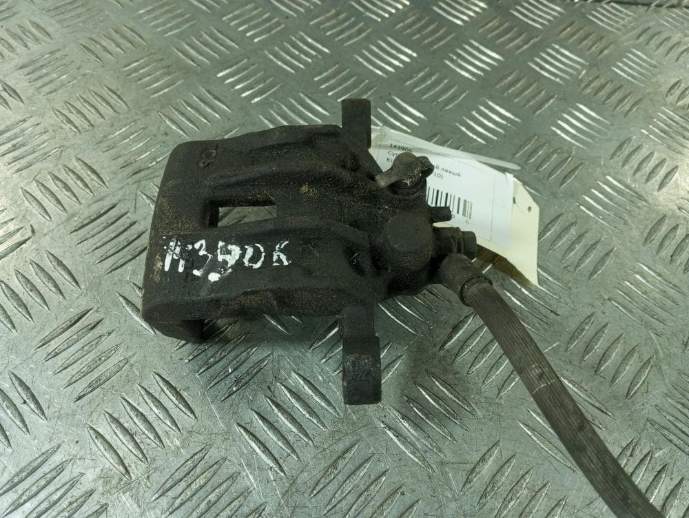 Суппорт задний левый к Kia Ceed 1 (06-10)