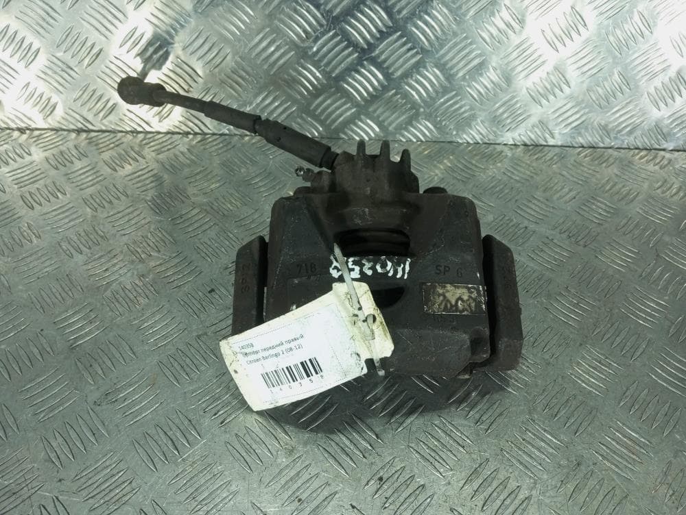 Суппорт передний правый к Citroen Berlingo 2 (08-12)