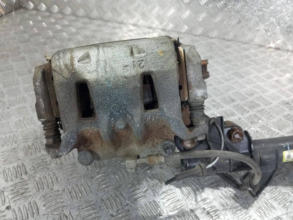 Стойка передняя правая к Nissan  Serena C25 (05-12)