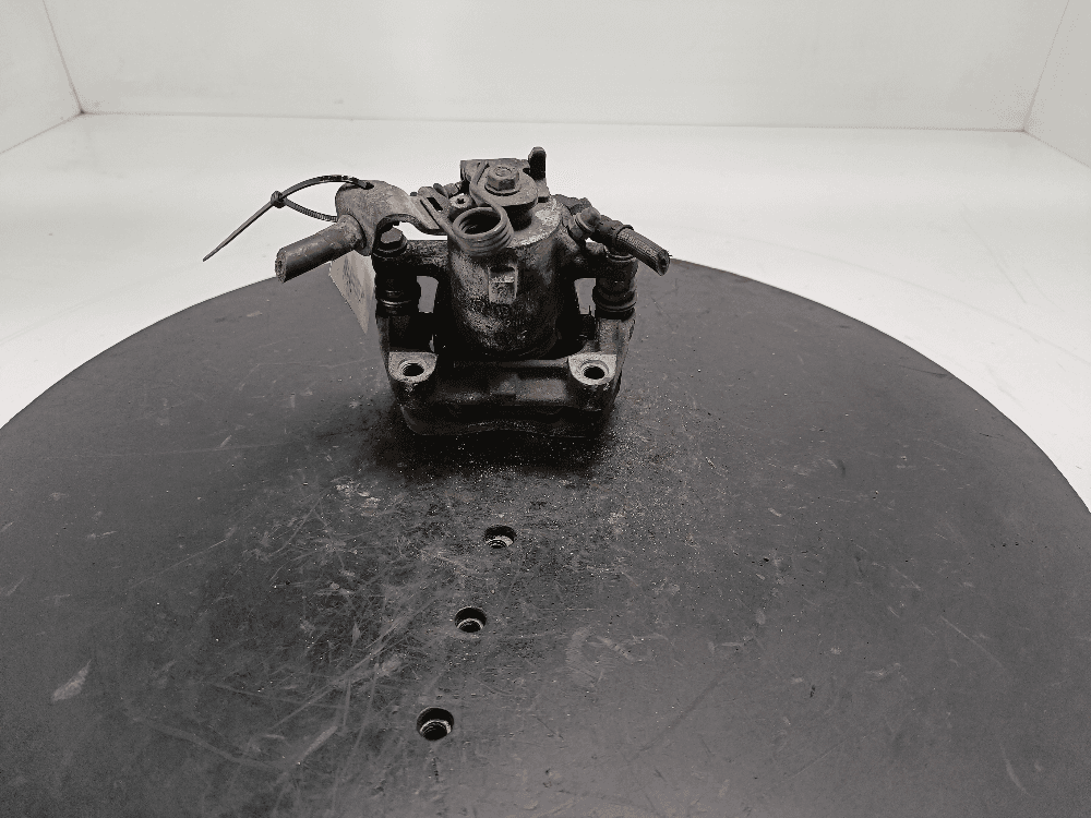 Суппорт задний левый к Opel Zafira B (05-10)