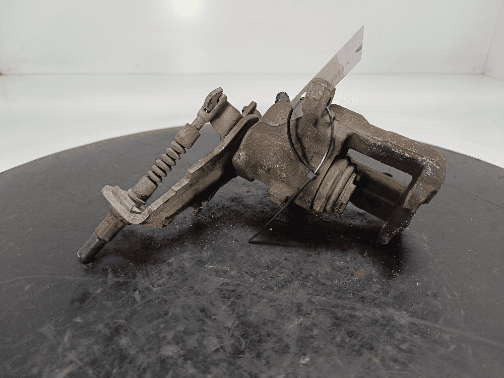 Суппорт задний левый к Nissan  Almera N16 Рестайлинг (03-06)