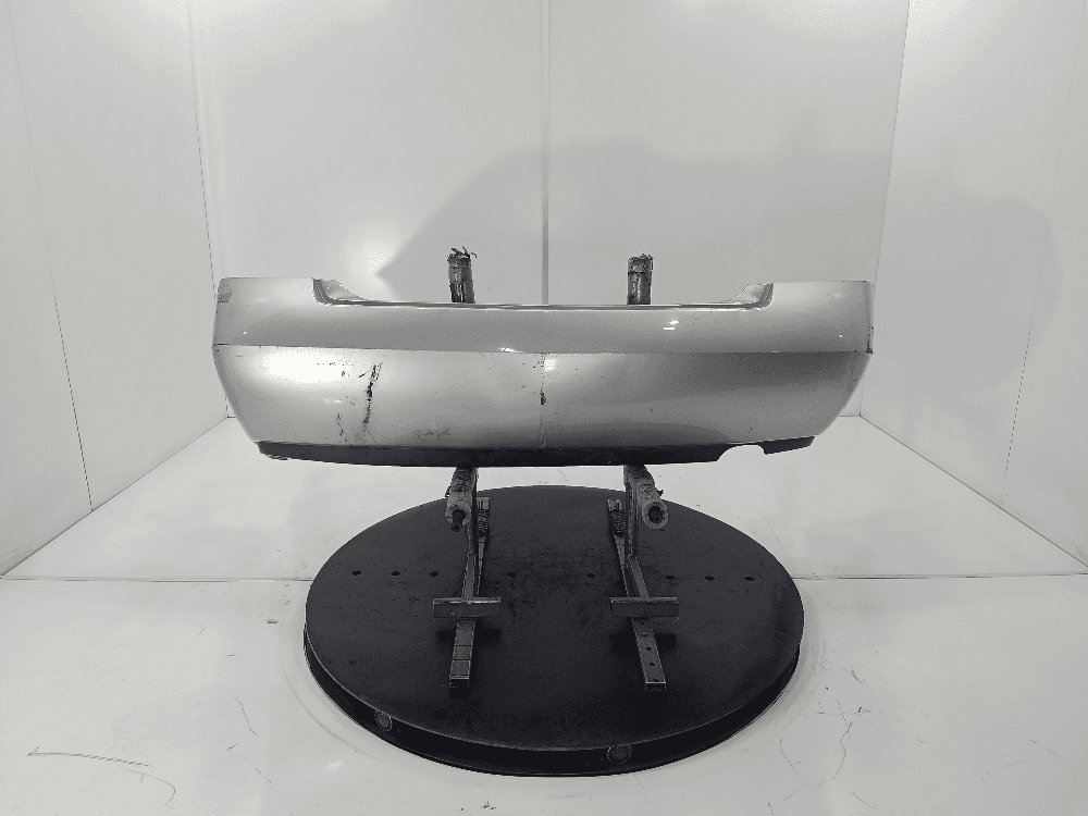 Бампер задний к Nissan  Primera P12 (02-08)