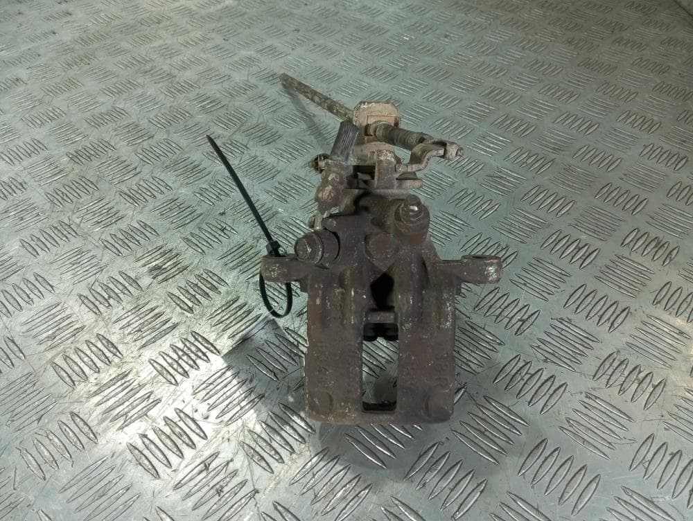 Суппорт задний правый к Nissan  Almera N16 Рестайлинг (03-06)