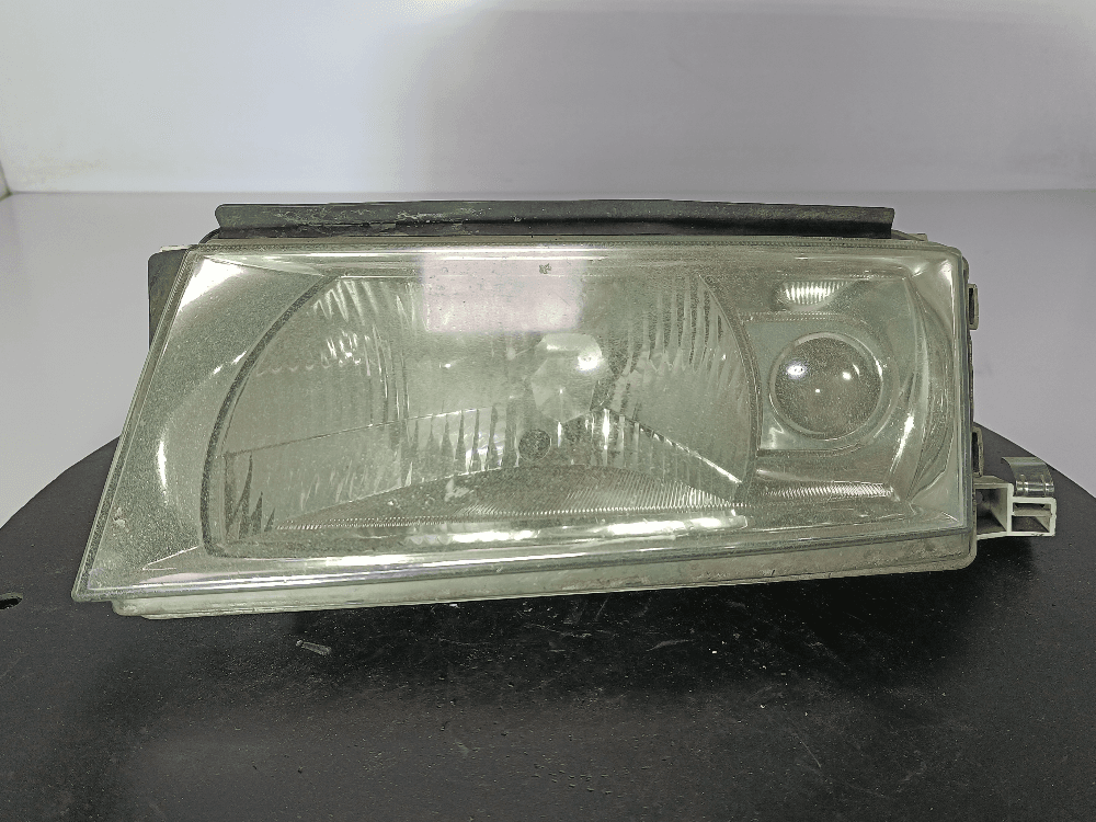 Фара левая к Skoda Octavia Tour Рестайлинг (00-10)