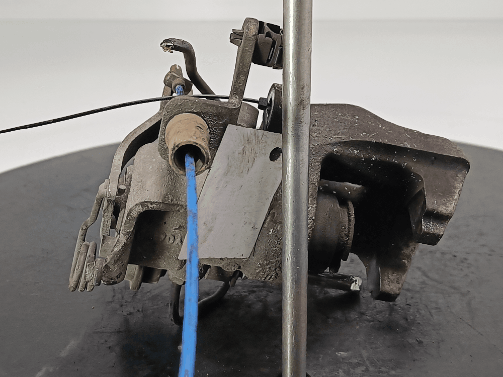 Суппорт задний левый к Citroen C4 Picasso 1 (06-13)