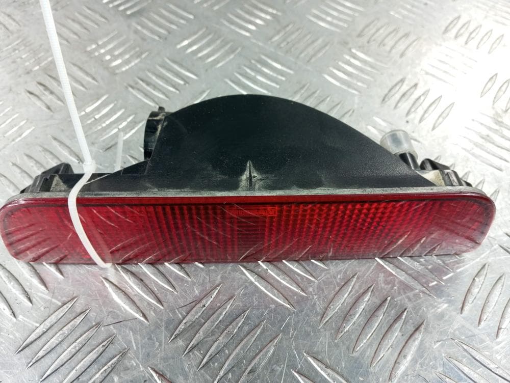 Фонарь противотуманный центральный к Nissan  Qashqai 1 (07-10)