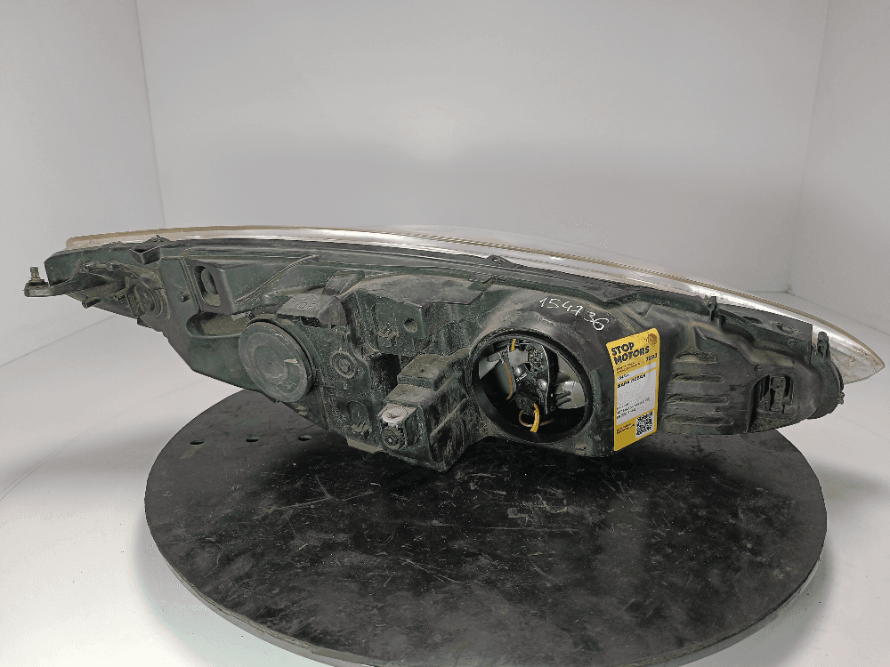 Фара левая к Peugeot 307 Рестайлинг (05-08)