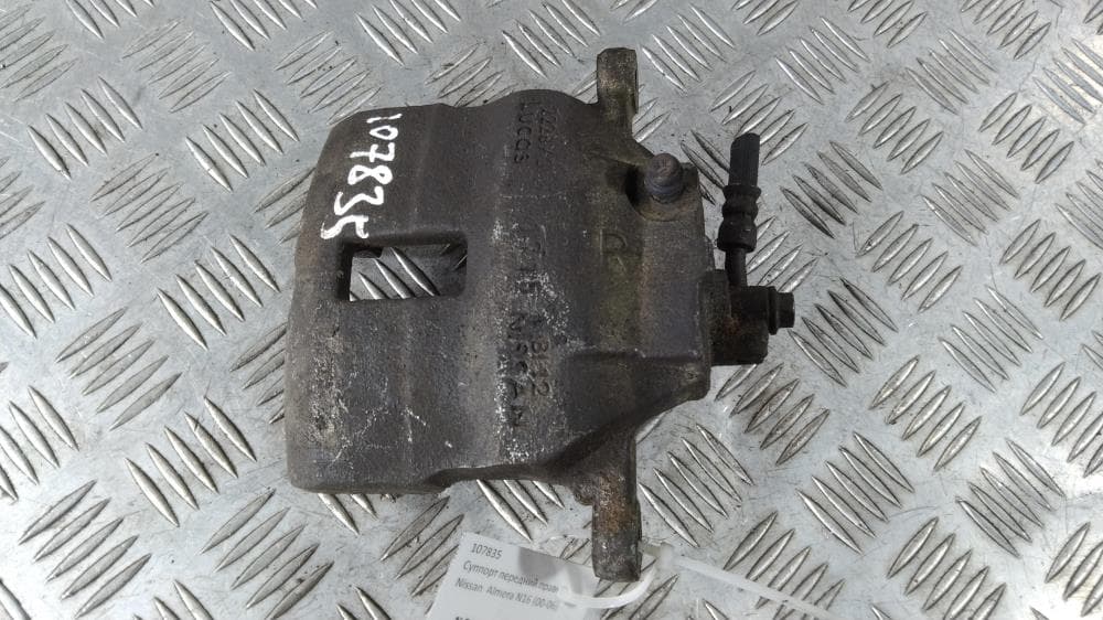 Суппорт передний правый к Nissan  Almera N16 Рестайлинг (03-06)