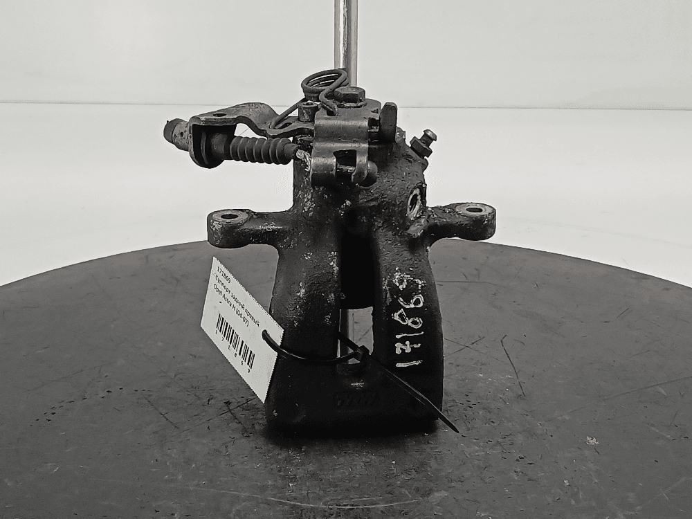 Суппорт задний правый к Opel Astra H (04-07)