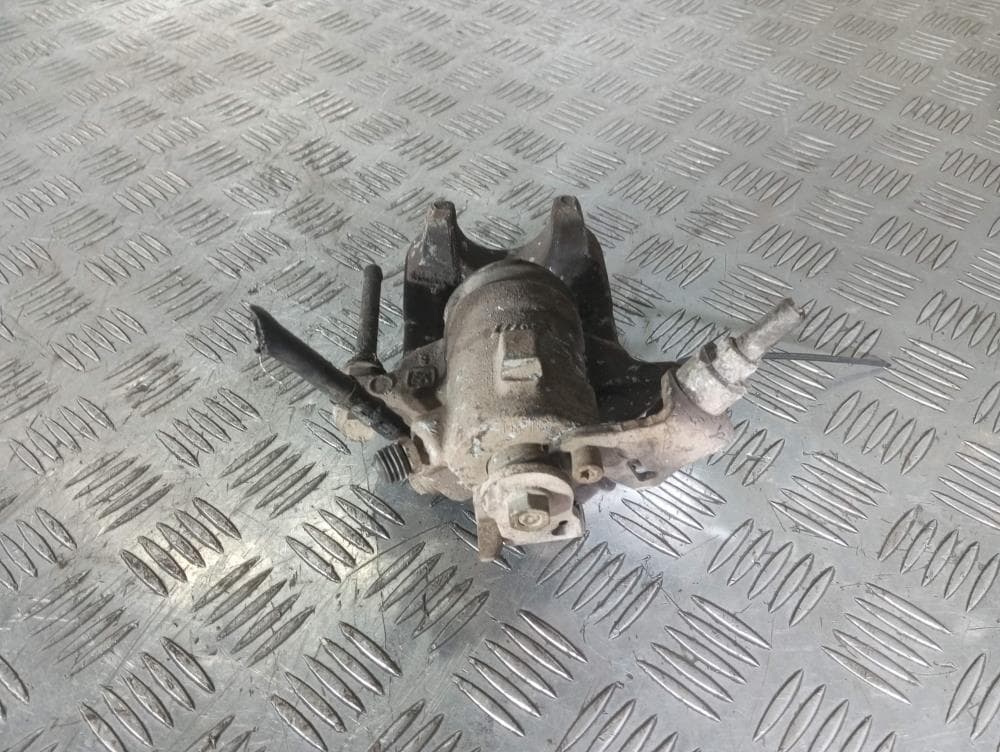 Суппорт задний левый к Volkswagen Golf 4 (97-06)