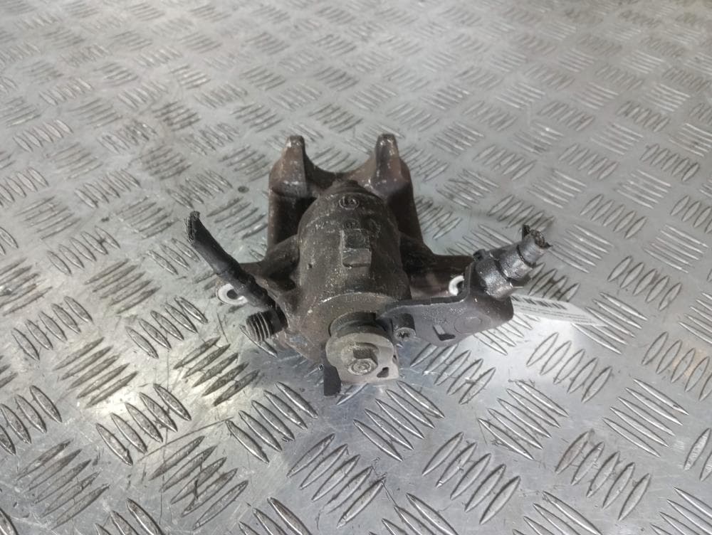 Суппорт задний левый к Volkswagen Golf 4 (97-06)