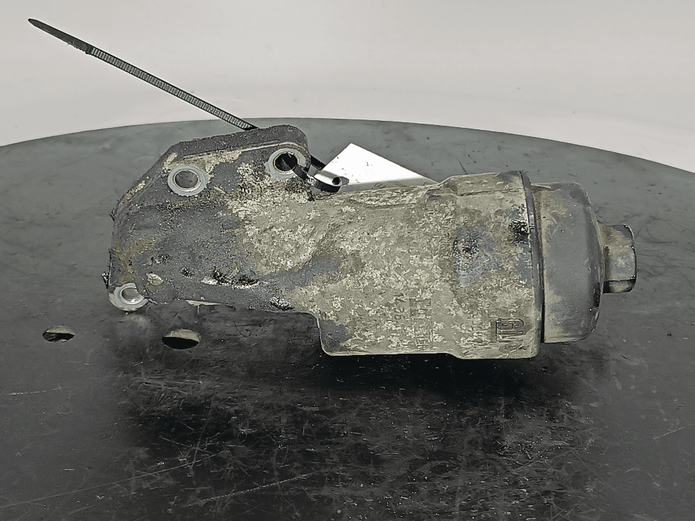 Корпус масляного фильтра к Opel Corsa D (06-11)