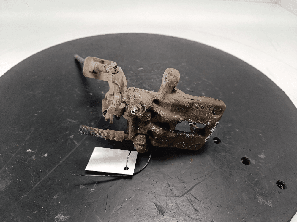 Суппорт задний правый к Nissan  Almera N16 Рестайлинг (03-06)