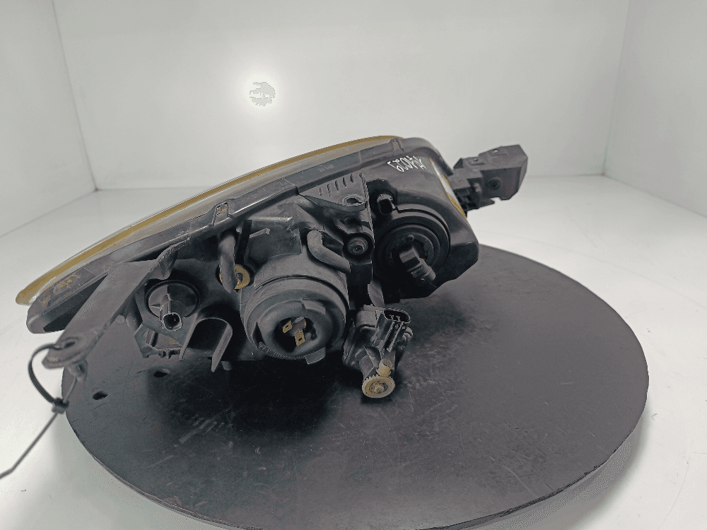 Фара левая к Mazda 3 BK Рестайлинг (06-09)