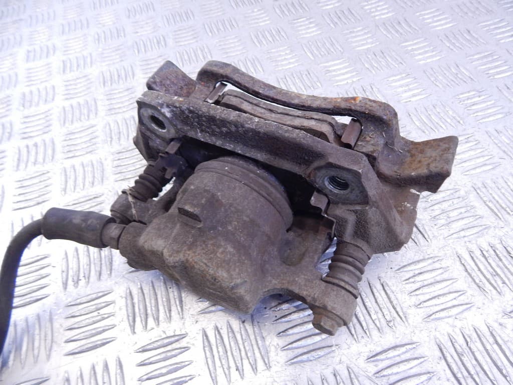 Суппорт передний левый к Mercedes A Class W168 (97-01)